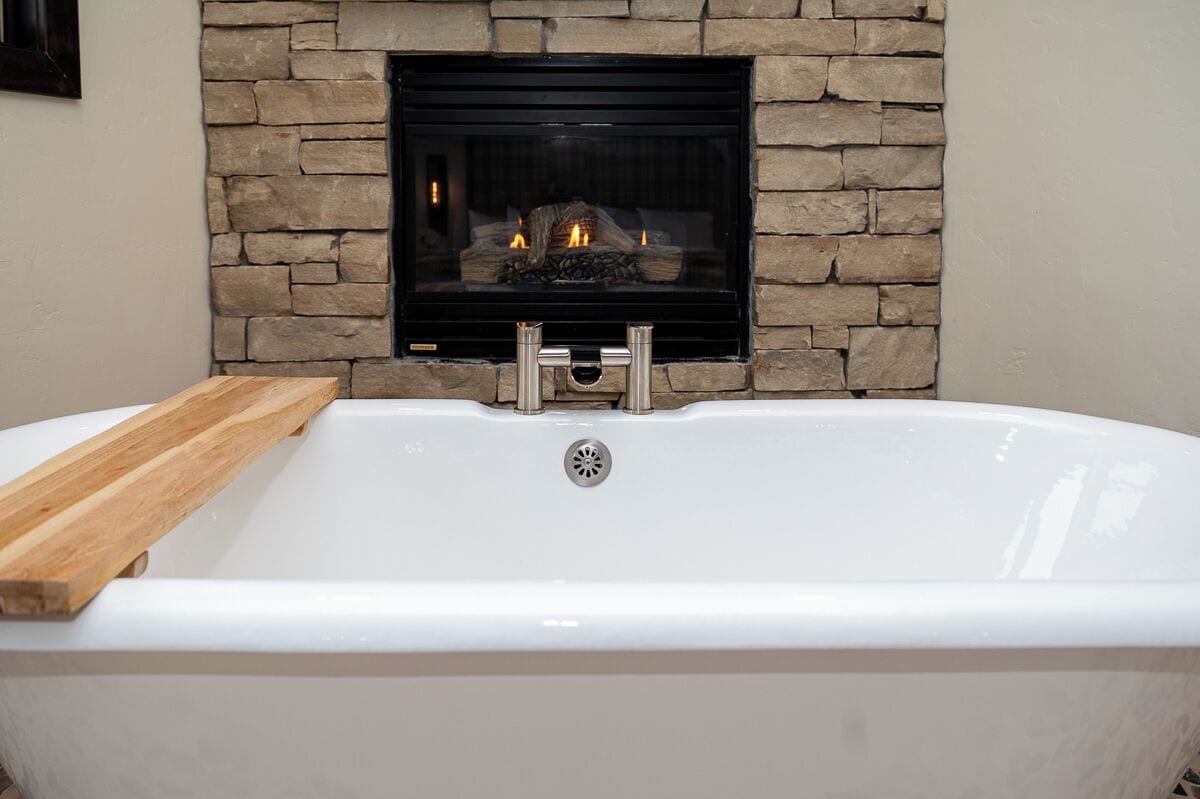 grand suite, 1 king bed with sofa bed, lake view (soaking tub, fireplace and patio) | egyptian cotton sheets, premium bedding, down duvets, pillow-top beds