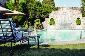 Outdoor pool, open 7 AM to 8 PM, pool umbrellas, sun loungers