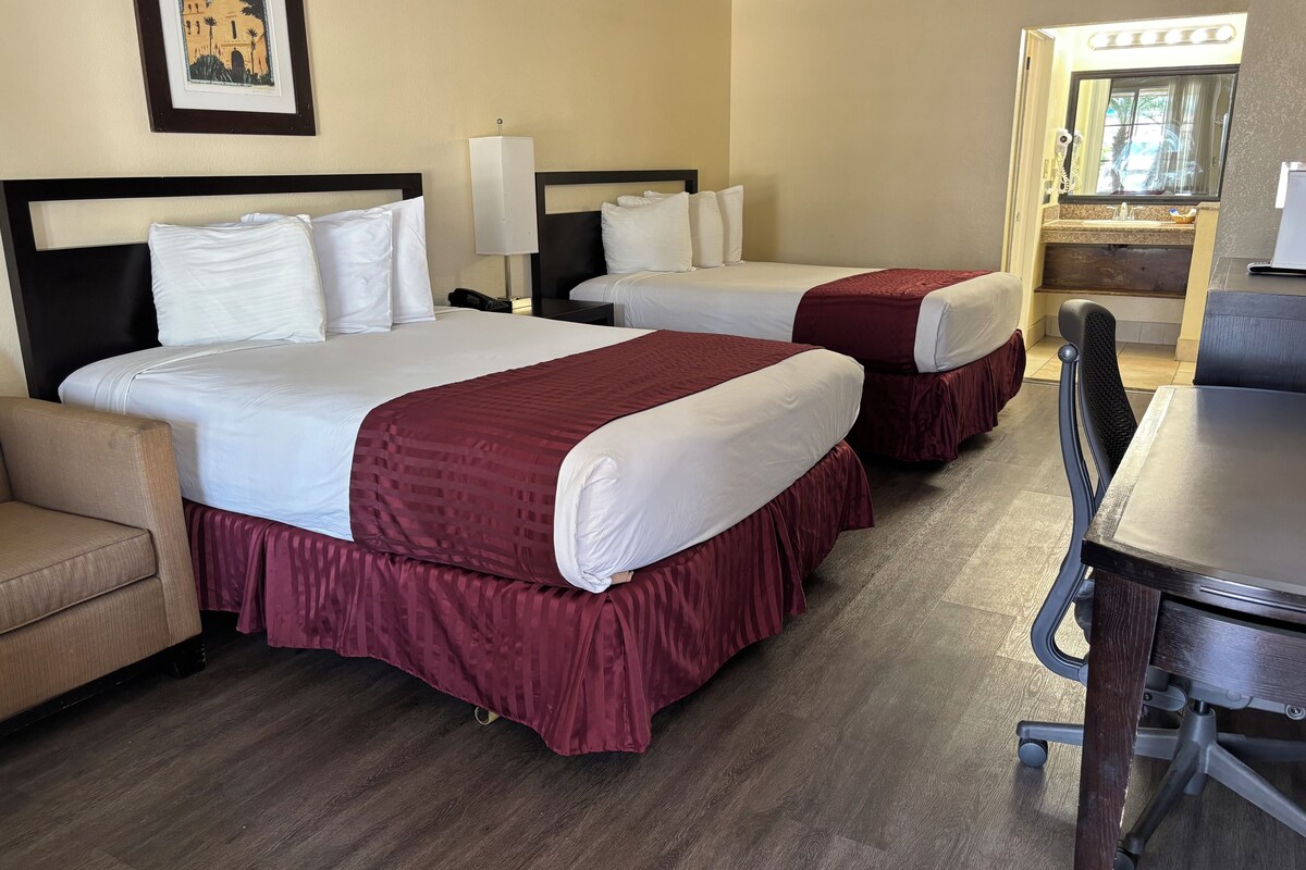 Standard Room, 2 Queen Beds | In-room safe, laptop workspace, blackout drapes, iron/ironing board