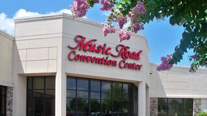 The Music Road Convention Center building facade with large windows and a clear sky. - Music Road Resort Hotel and Inn (Pigeon Forge)