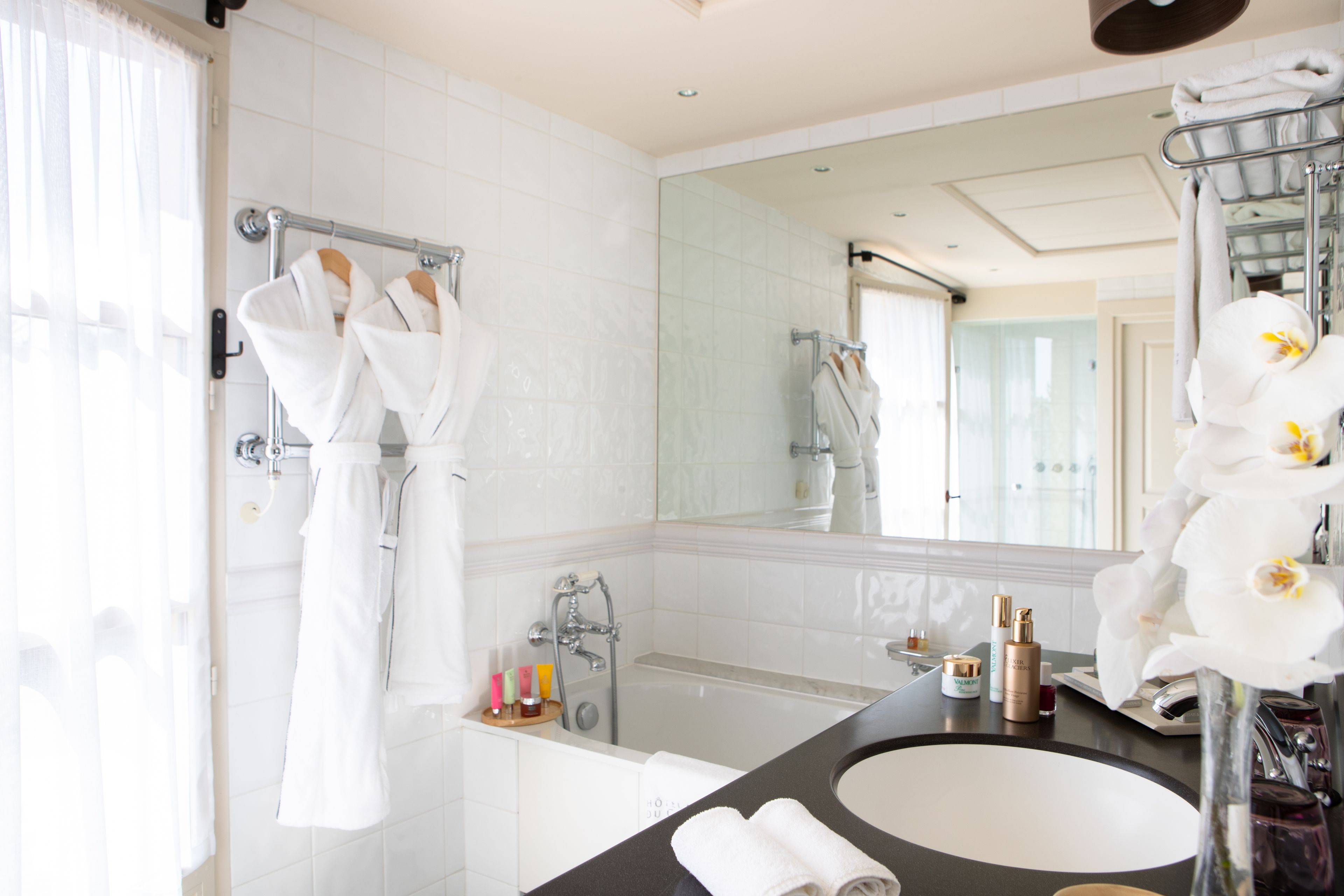 separate bathtub and shower, free toiletries, hair dryer, bathrobes