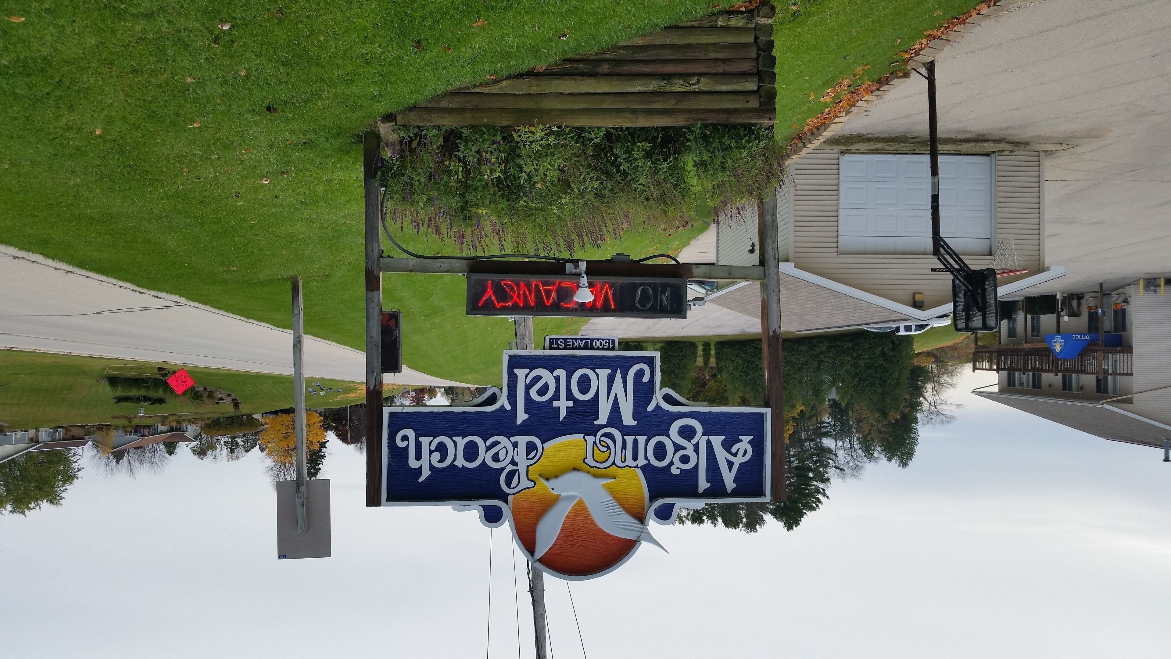 A street view with a sign for 'Bonaventure Mall' and a 'No Parking' sign.