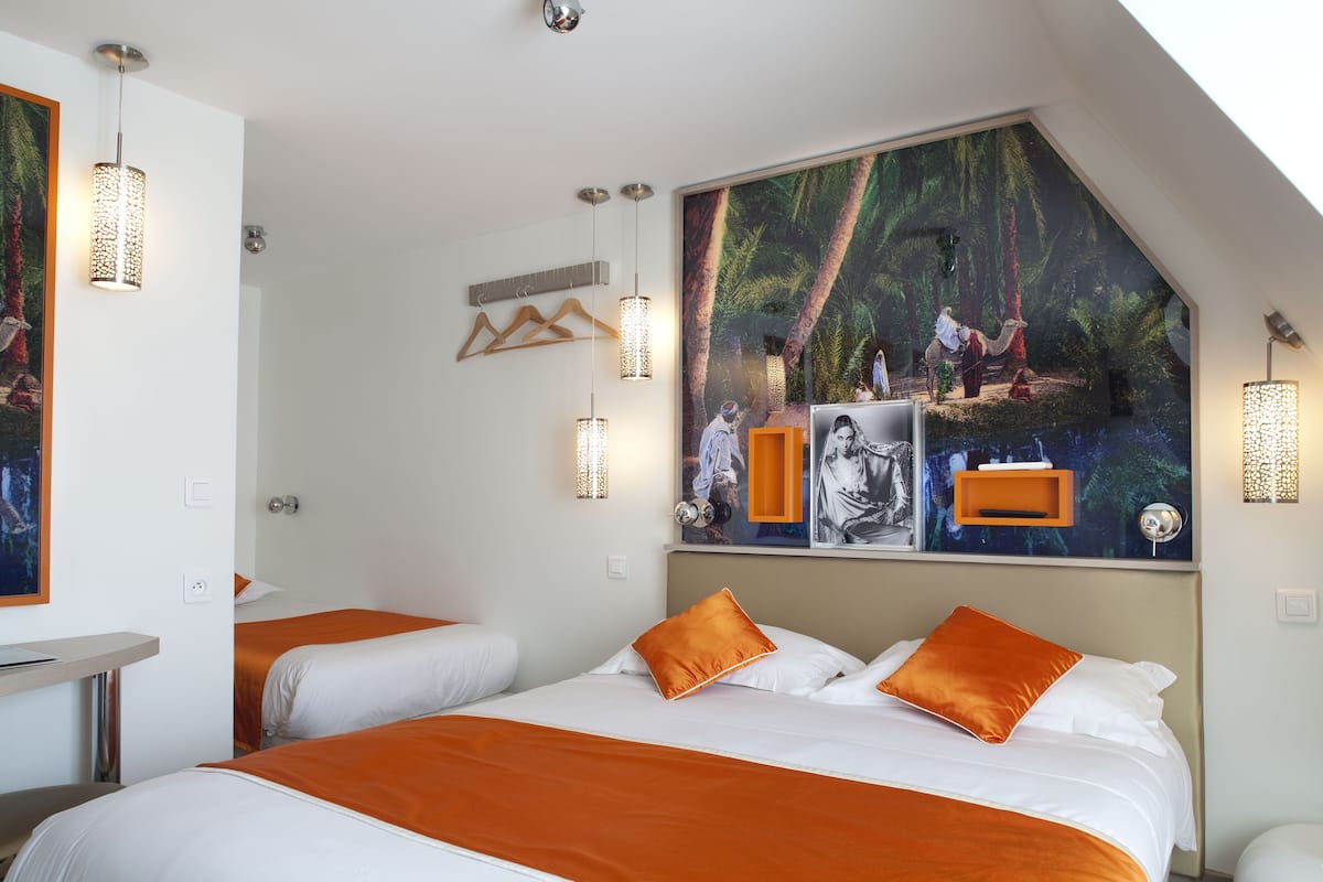Superior Triple Room, City View | Premium bedding, minibar, in-room safe, individually decorated