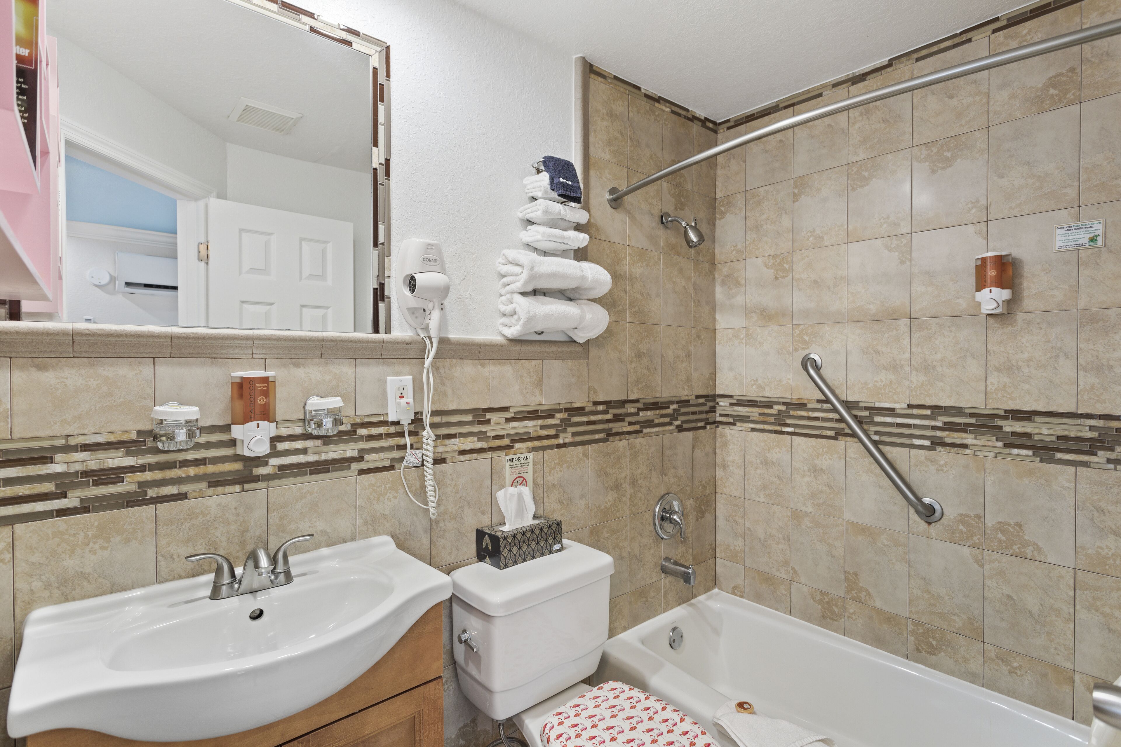 combined shower/bathtub, free toiletries, hair dryer, towels