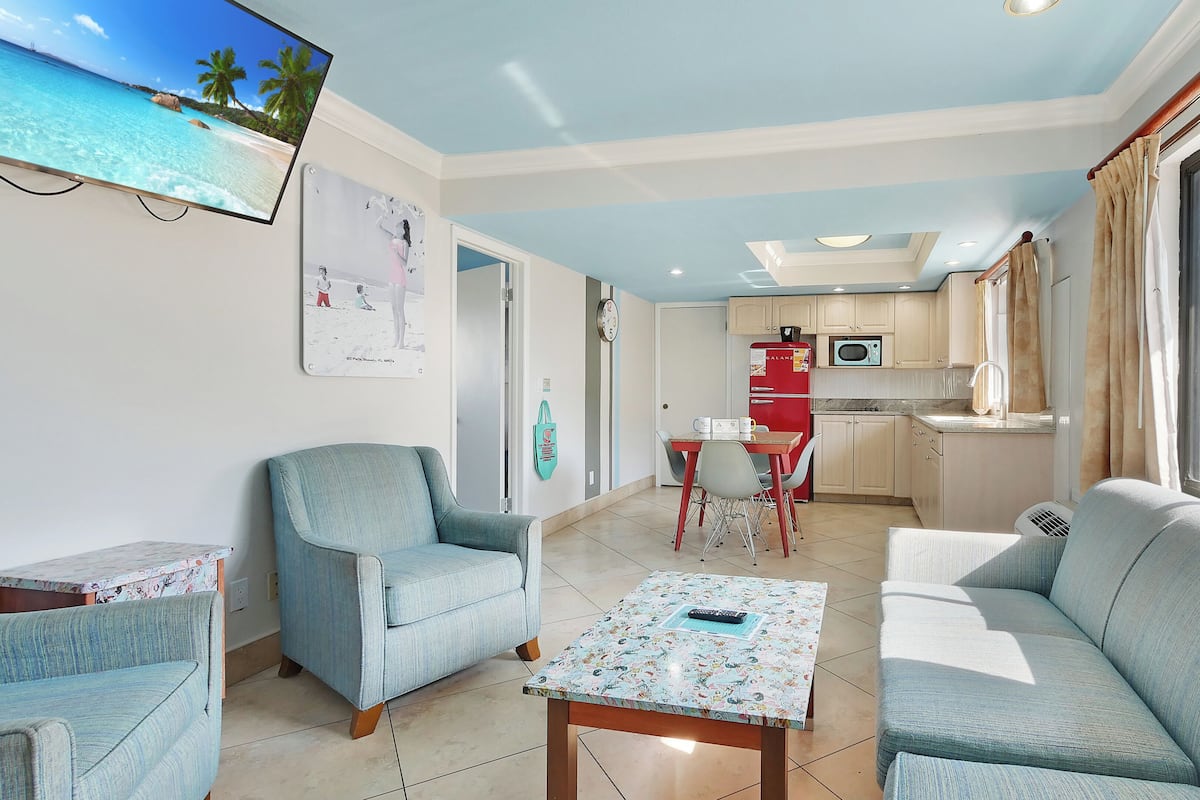 Deluxe Suite, 1 Bedroom (2 Queen beds and 1 Sofa bed) | In-room safe, blackout drapes, iron/ironing board, cribs (free)