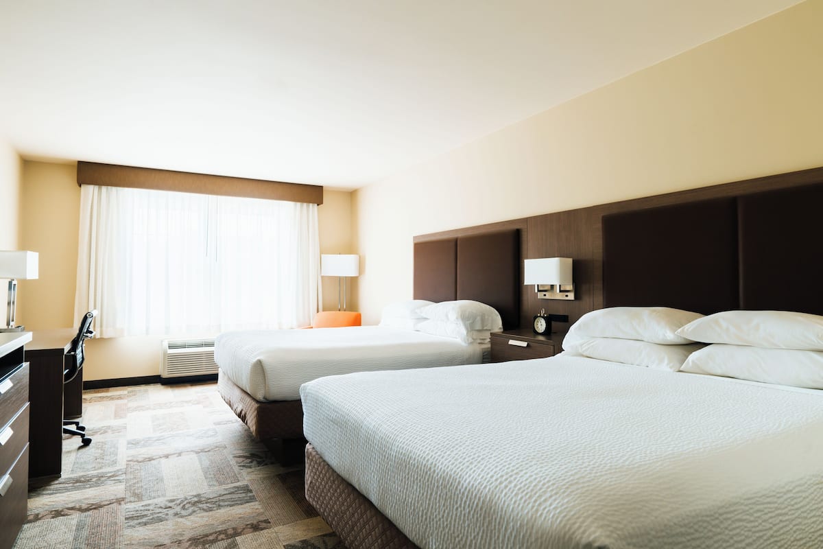 deluxe room, 2 queen beds not ocean view | 1 bedroom, desk, laptop workspace, blackout curtains