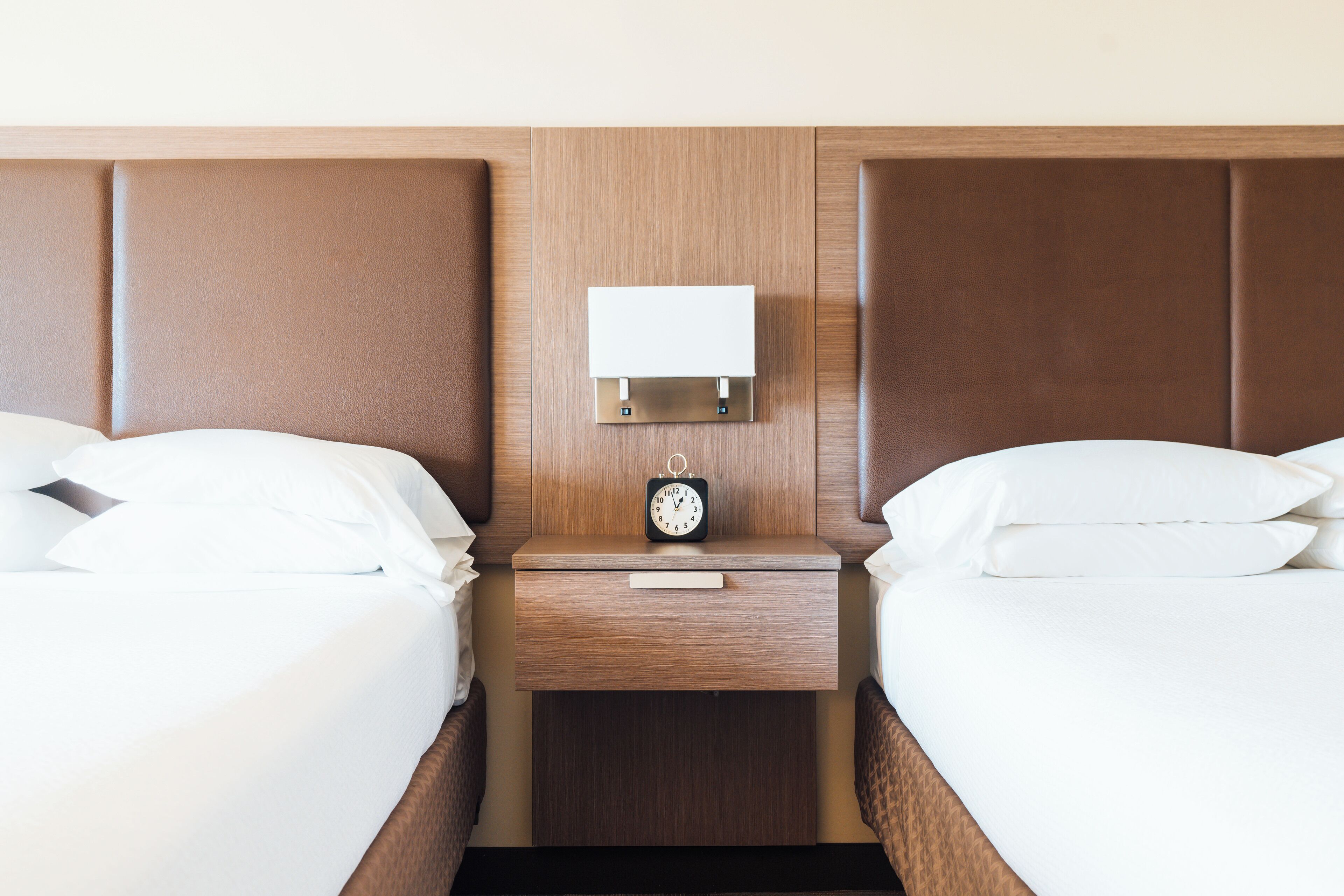 Desk, laptop workspace, blackout drapes, iron/ironing board