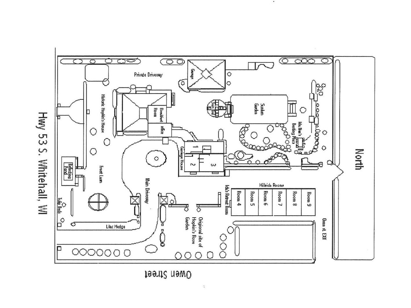 A floor plan of a hotel with a private driveway, main driveway, and a garden area.