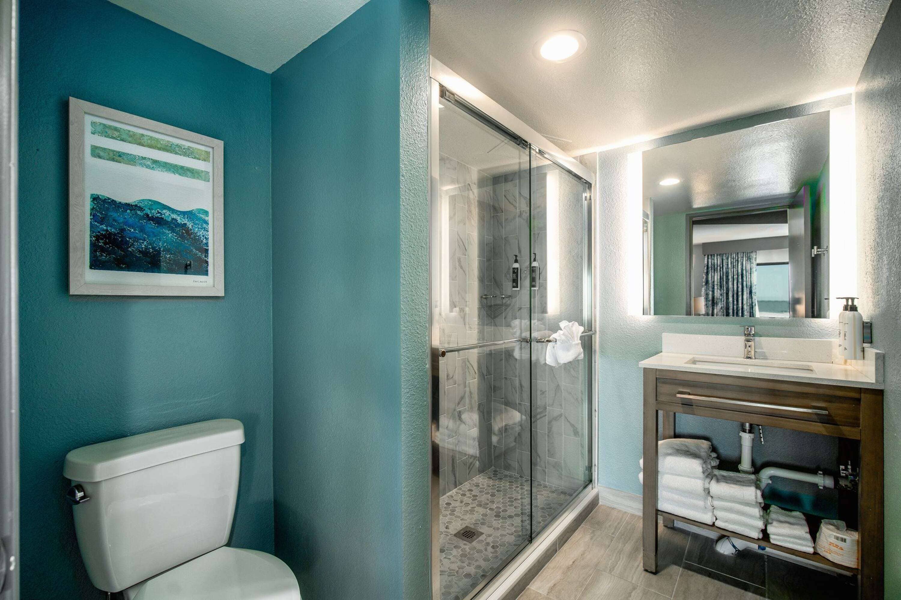 room, 1 king bed, non smoking, balcony (ocean/pool view) | bathroom | combined shower/bathtub, free toiletries, hair dryer, towels