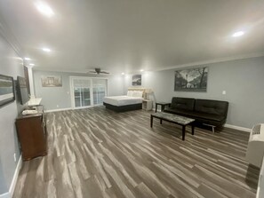 Family Suite, 2 Bedrooms, Kitchen | Living area | 32-inch flat-screen TV with cable channels, TV