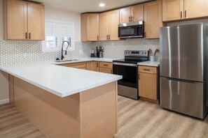 Family Suite, 2 Bedrooms, Kitchen | Private kitchen | Mini-fridge, microwave, coffee/tea maker - Lone Oak Lodge (Monterey)