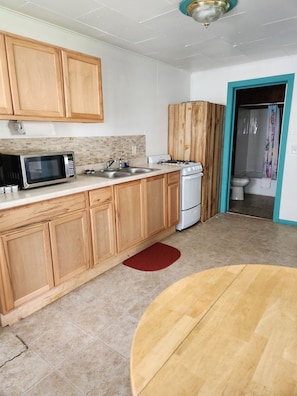 Exclusive Cottage, 1 Bedroom, Kitchen, Courtyard Area | Private kitchen | Fridge, microwave - Little River Motel (St. Regis)