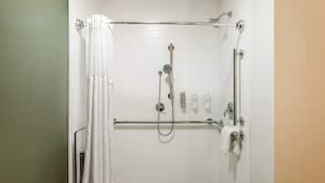 Room, 1 King Bed, Accessible (Mobility & Hearing, Roll-in Shower) | Bathroom | Combined shower/tub, free toiletries, hair dryer, towels