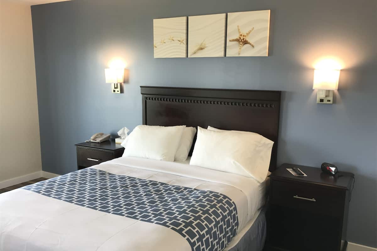 Deluxe Suite, Non Smoking, Ocean View | 1 bedroom, down comforters, desk, soundproofing