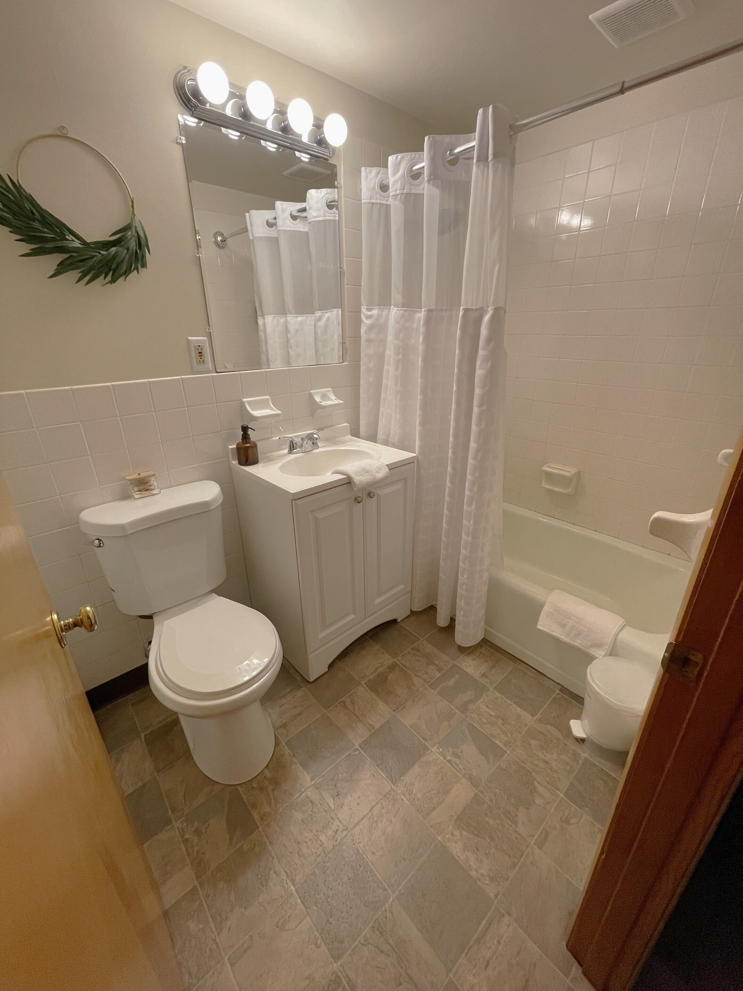 deluxe suite, 2 queen beds, kitchen | bathroom | combined shower/bathtub, hair dryer, towels, soap