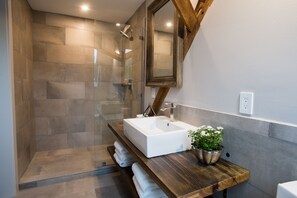 Shower, rainfall showerhead, designer toiletries, hair dryer