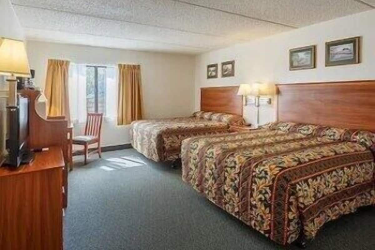 Coffres-forts dans les chambres, fer et planche Ă repasser