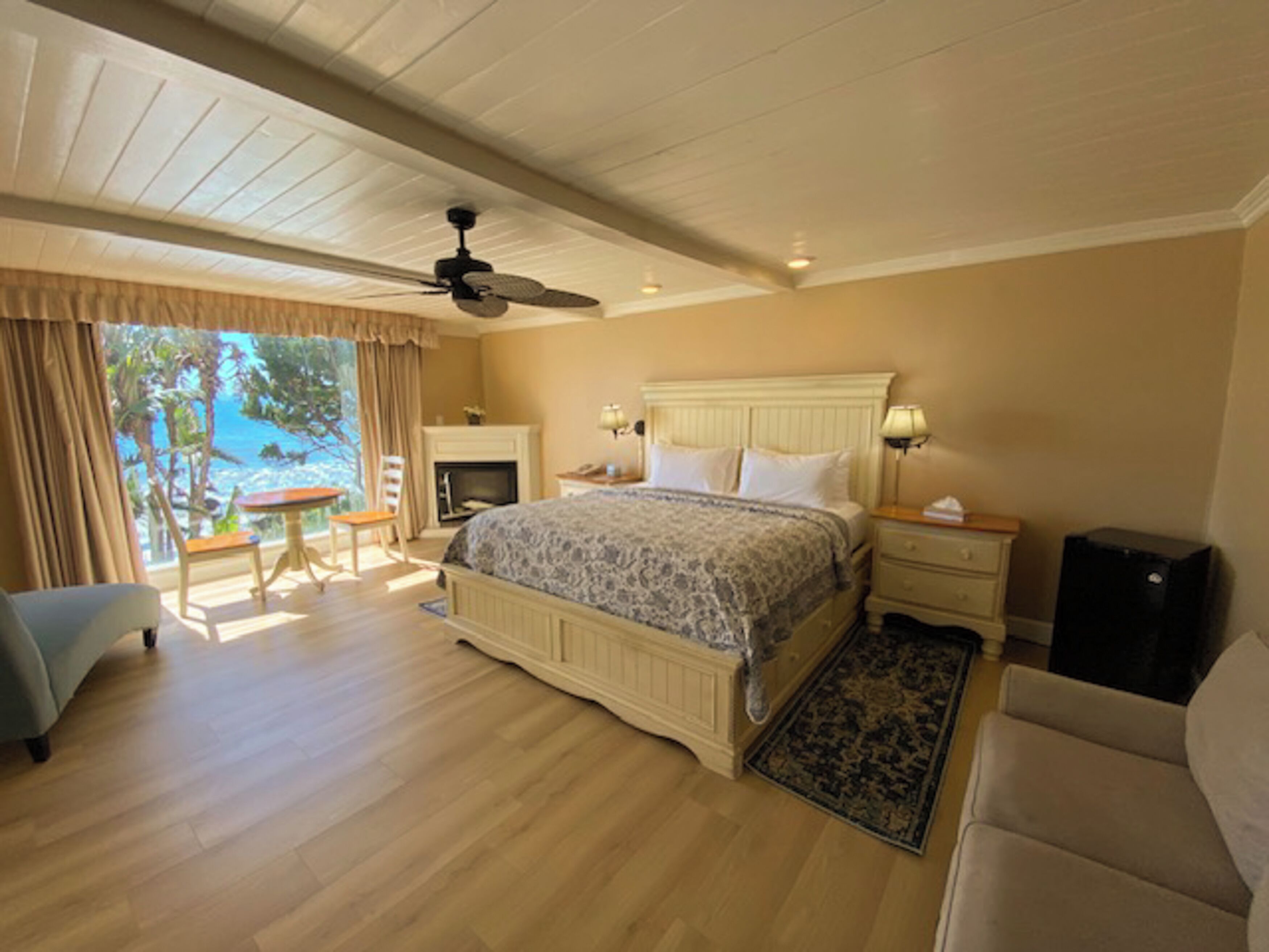 deluxe room #1, ocean view, fireplace | desk, blackout curtains, iron/ironing board, free wifi