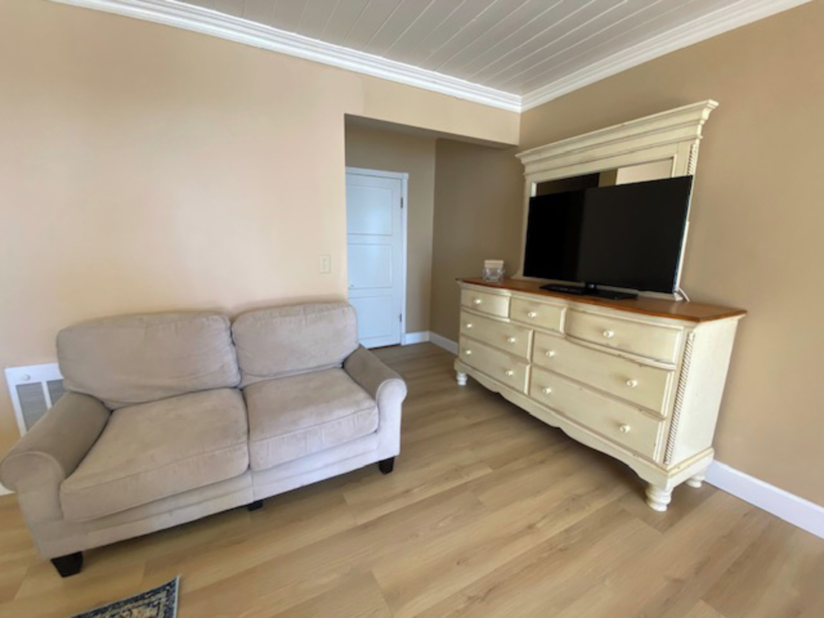 deluxe room #1, ocean view, fireplace | television