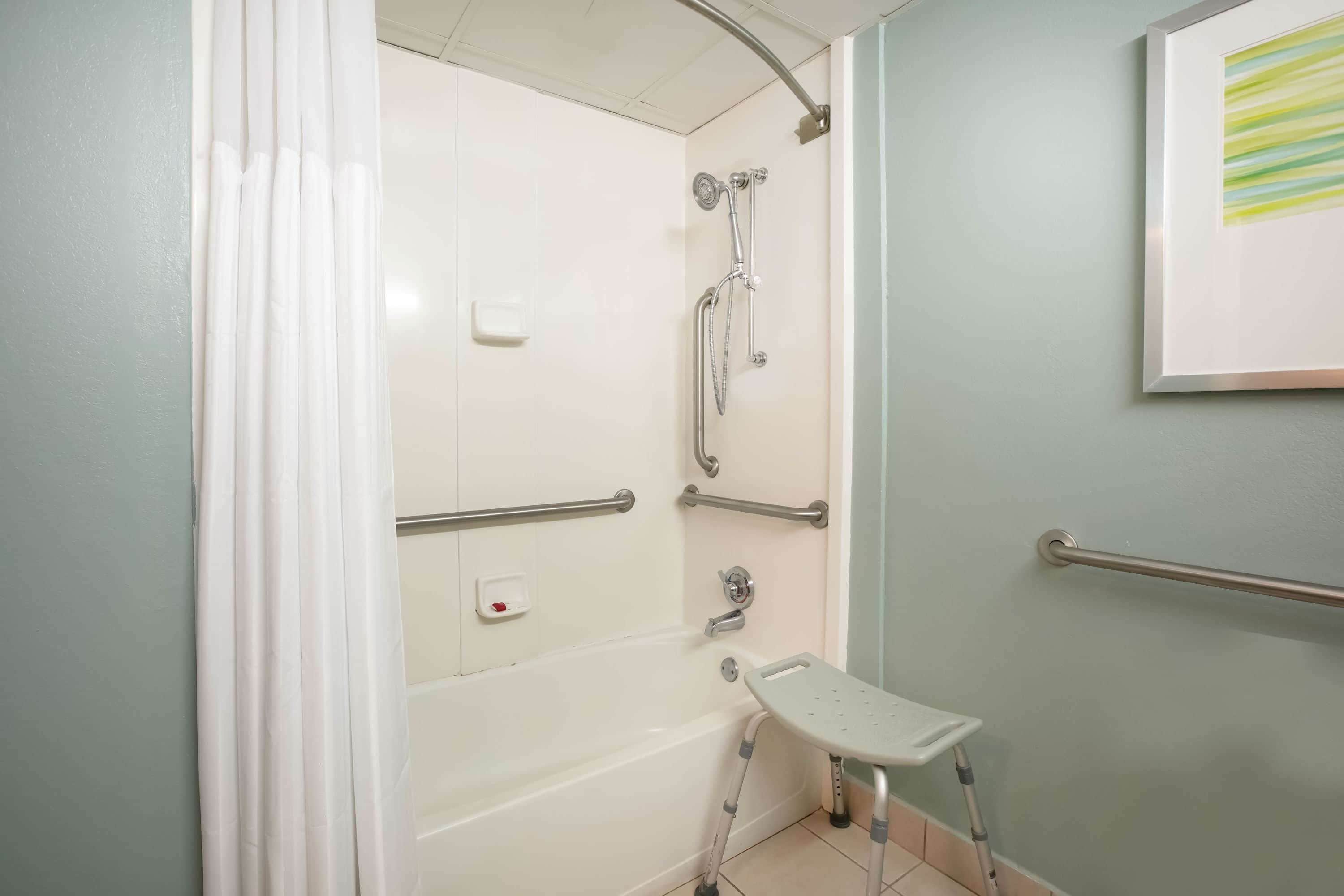 combined shower/bathtub, free toiletries, hair dryer, towels