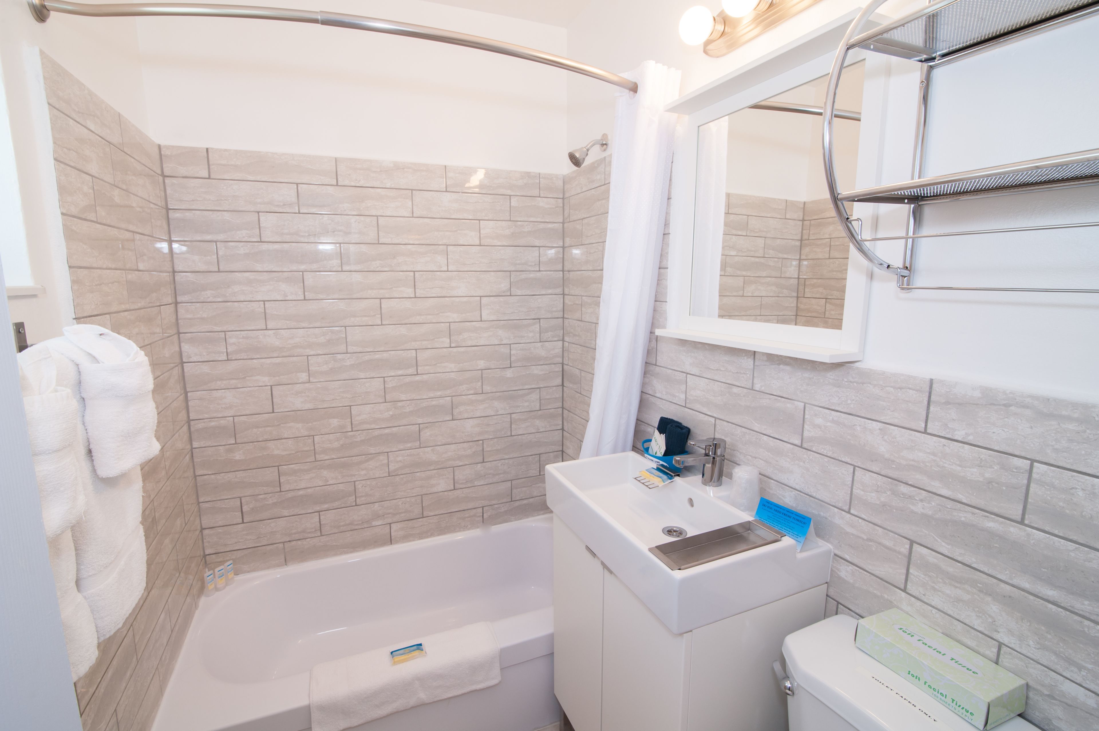 combined shower/bathtub, free toiletries, hair dryer, towels