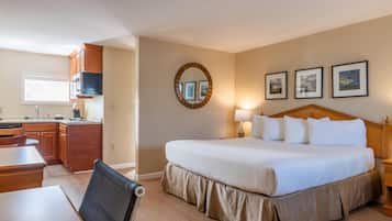 Room, 1 King Bed (Efficiency) | Hypo-allergenic bedding, desk, blackout drapes, iron/ironing board