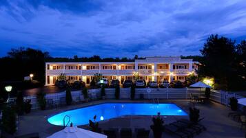 Seasonal outdoor pool, open 9:00 AM to 8:00 PM, sun loungers