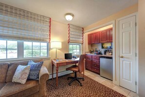 Suite, 1 King Bed with Sofa bed, Non Smoking | Hypo-allergenic bedding, desk, blackout drapes, iron/ironing board