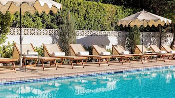 Outdoor pool, pool umbrellas, pool loungers