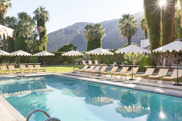 Outdoor pool, pool umbrellas, sun loungers