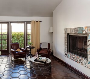 Suite (Melvyn's) | Living area | 50-inch Smart TV with digital channels, Netflix, streaming services