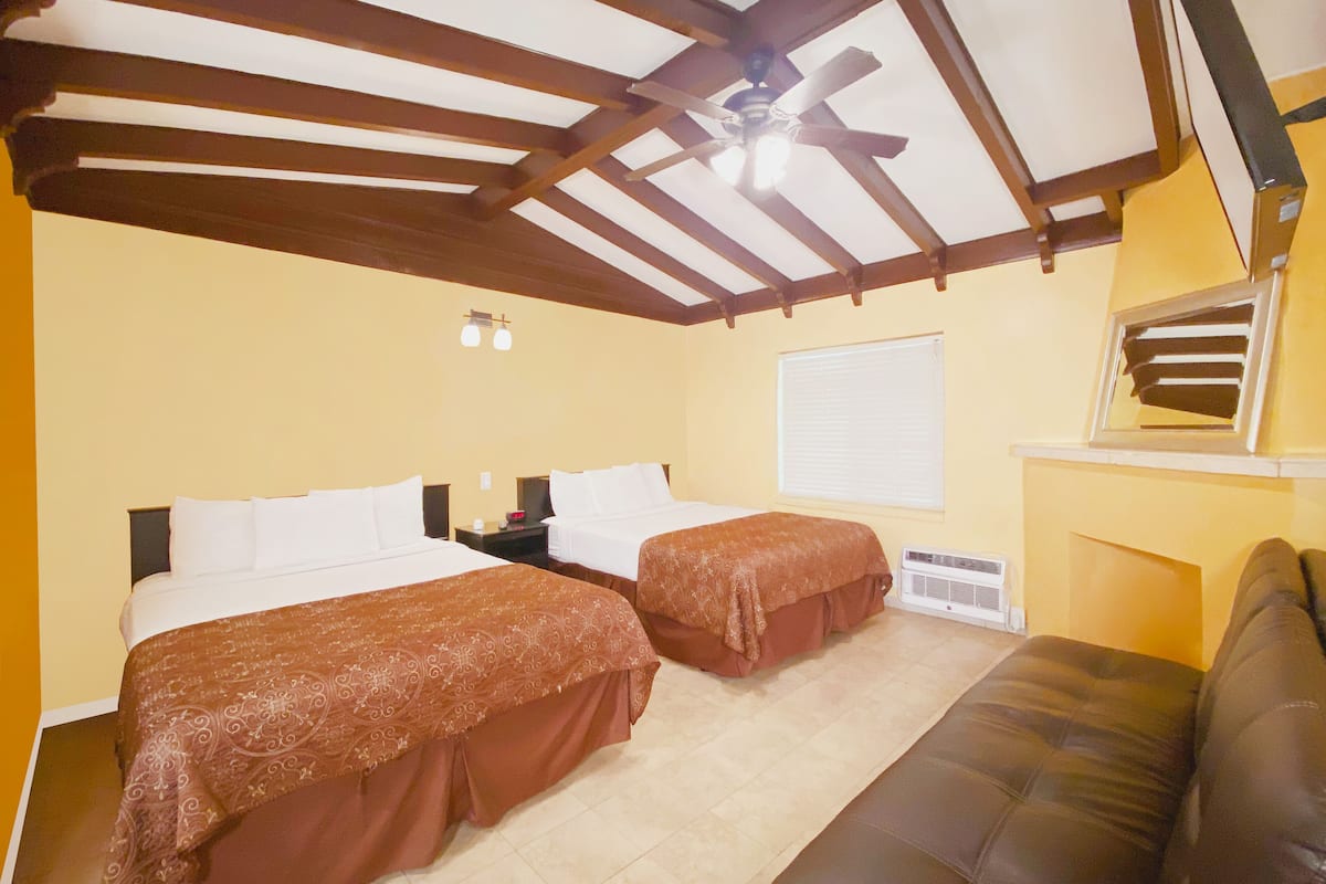 Deluxe Room, Multiple Beds, Non Smoking, Refrigerator & Microwave | Soundproofing, iron/ironing board, free WiFi, bed sheets