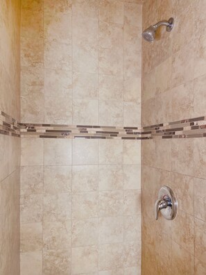 Deluxe Room, Multiple Beds, Non Smoking, Refrigerator & Microwave | Bathroom shower