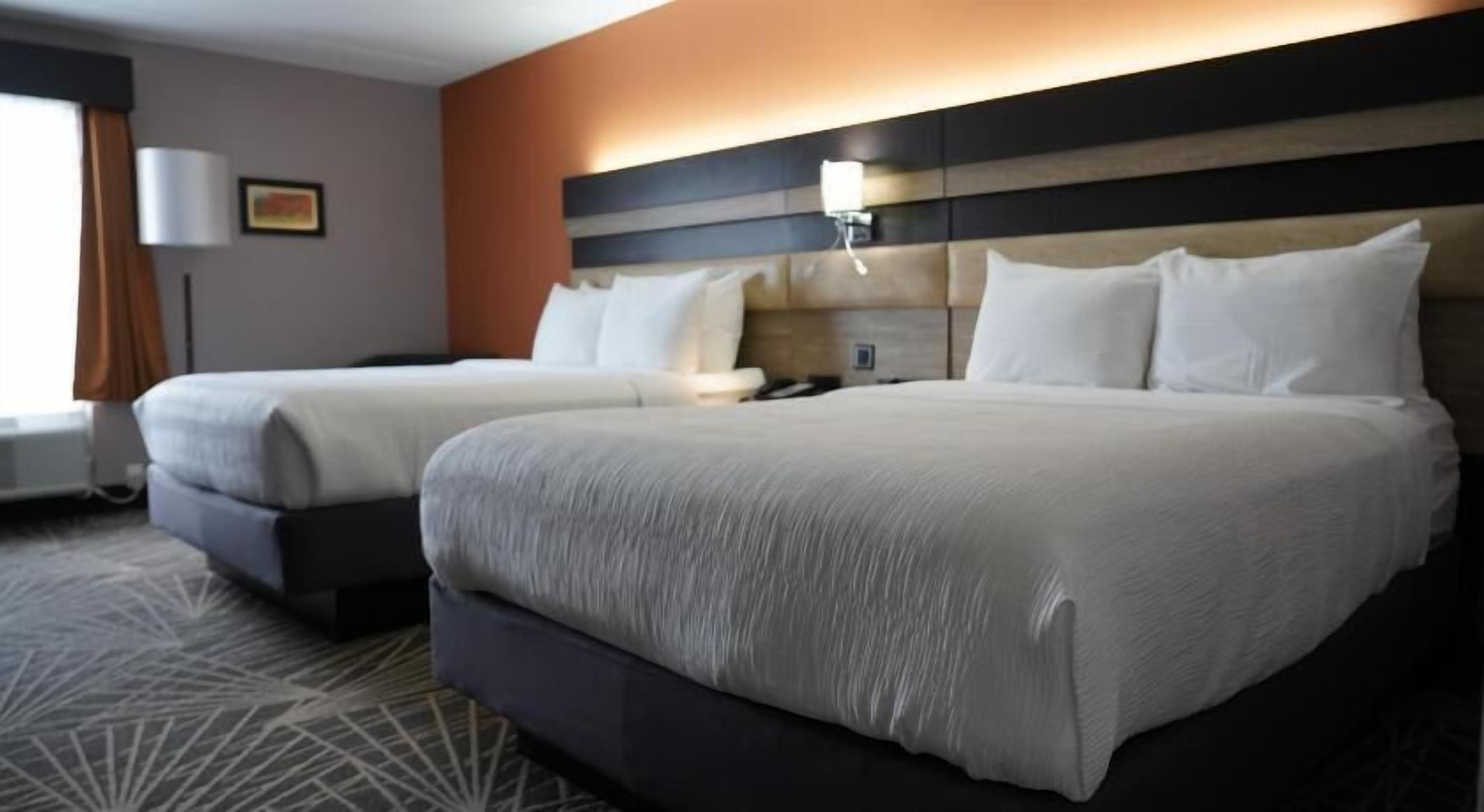 Pillowtop beds, laptop workspace, blackout drapes, iron/ironing board