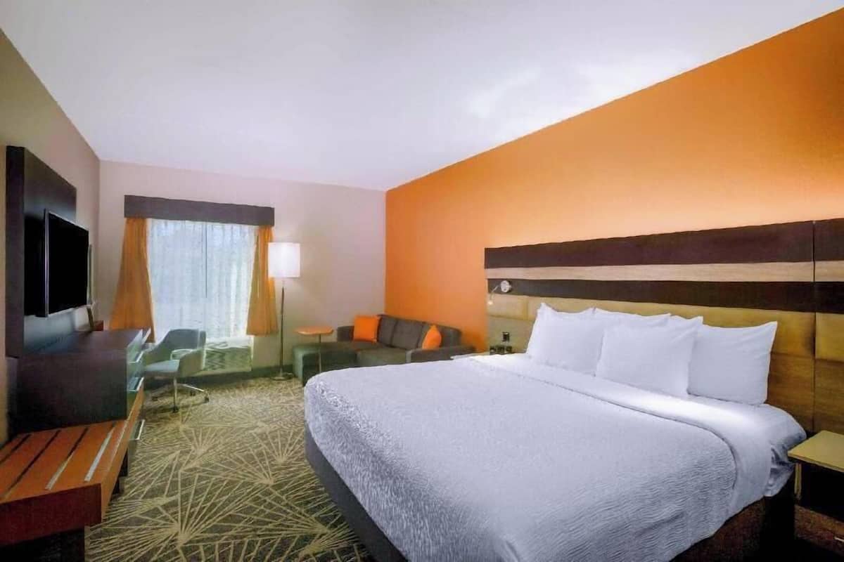 Pillowtop beds, laptop workspace, blackout drapes, iron/ironing board