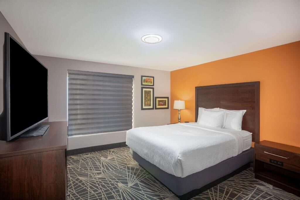 Pillowtop beds, laptop workspace, blackout drapes, iron/ironing board