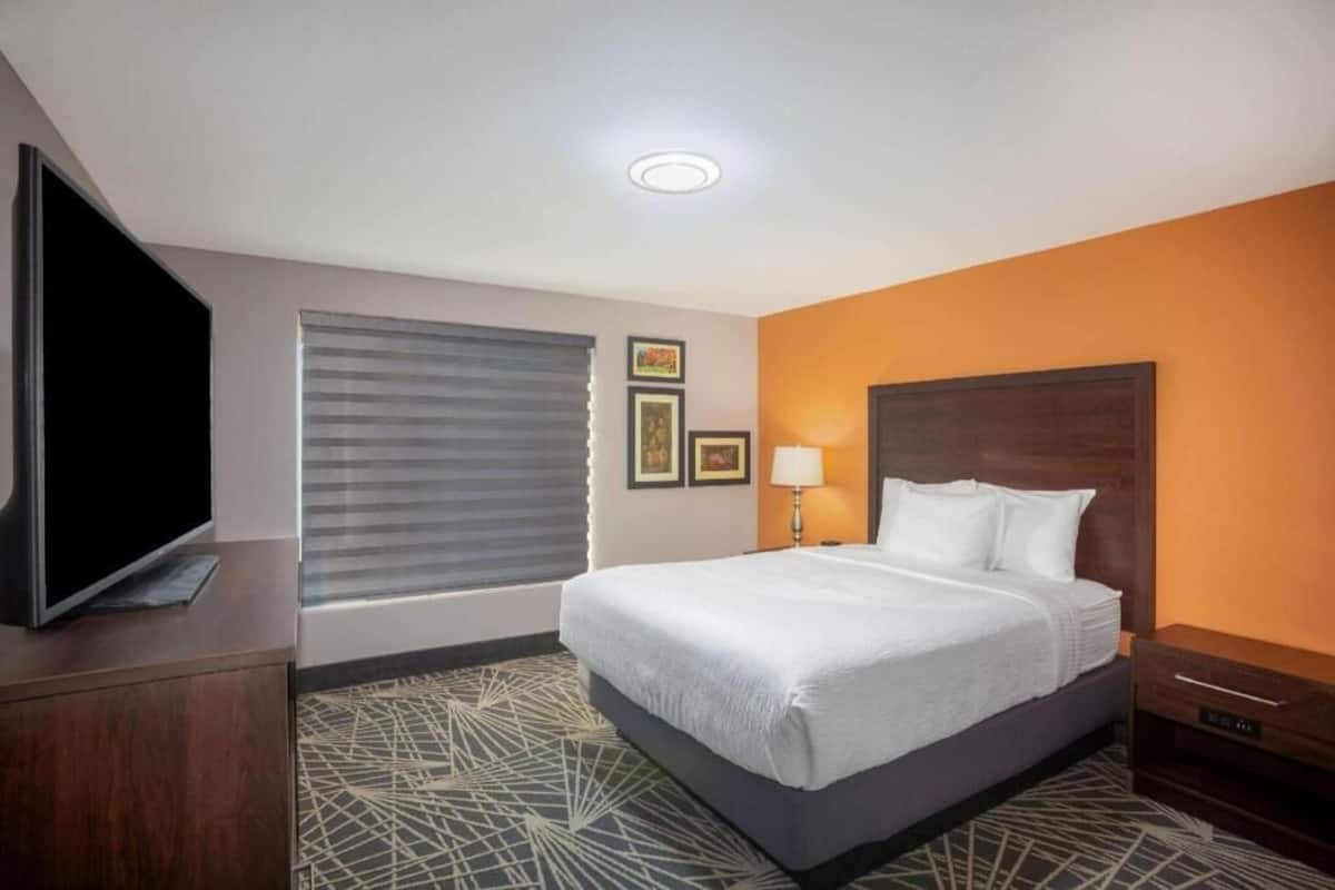 Pillowtop beds, laptop workspace, blackout drapes, iron/ironing board