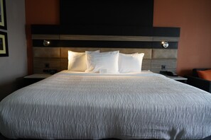 Pillow-top beds, laptop workspace, blackout curtains, iron/ironing board
