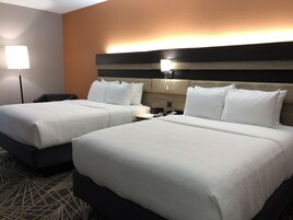 Pillow-top beds, laptop workspace, blackout curtains, iron/ironing board