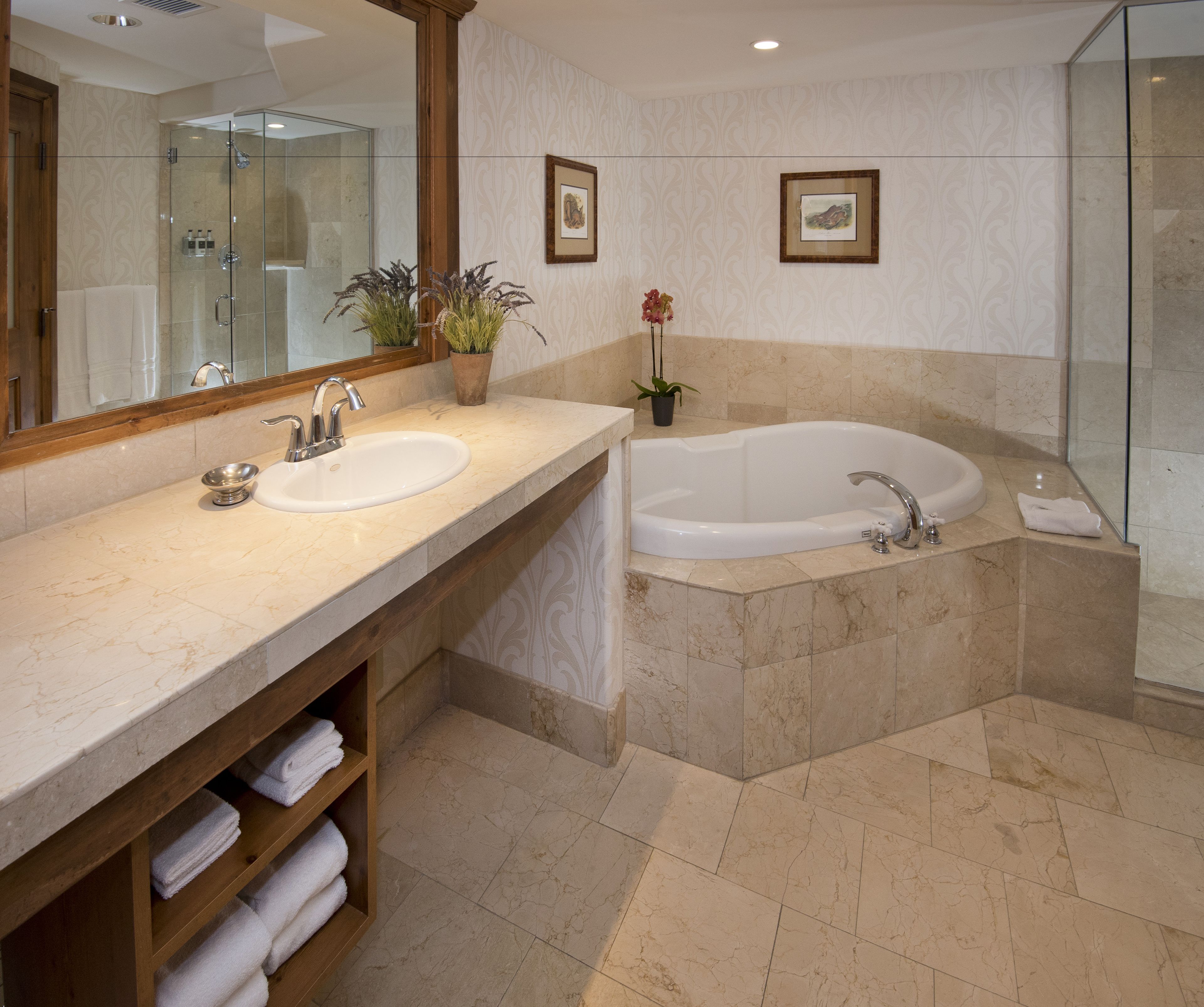 designer toiletries, hair dryer, bathrobes, slippers