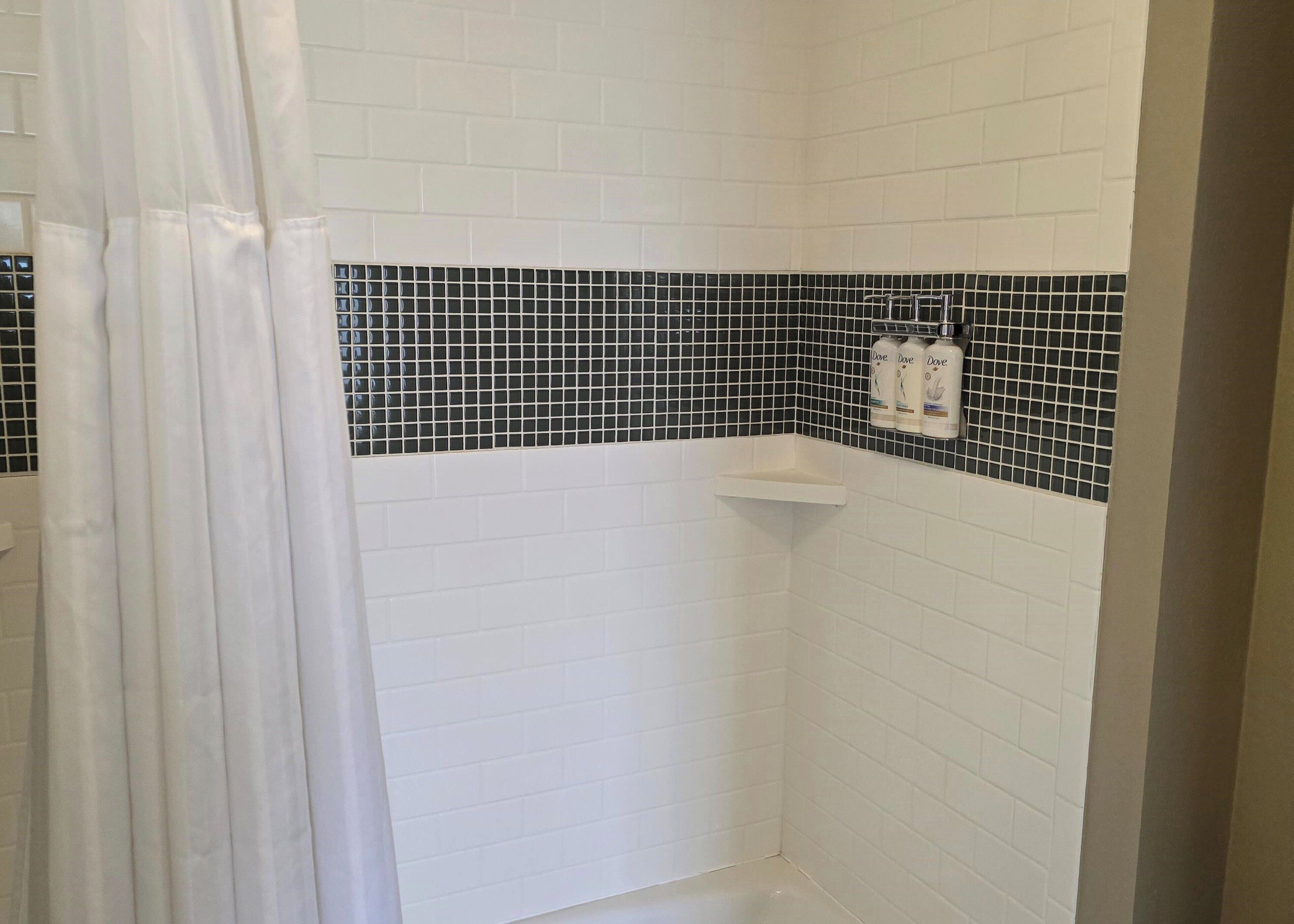combined shower/bathtub, free toiletries, hair dryer, towels