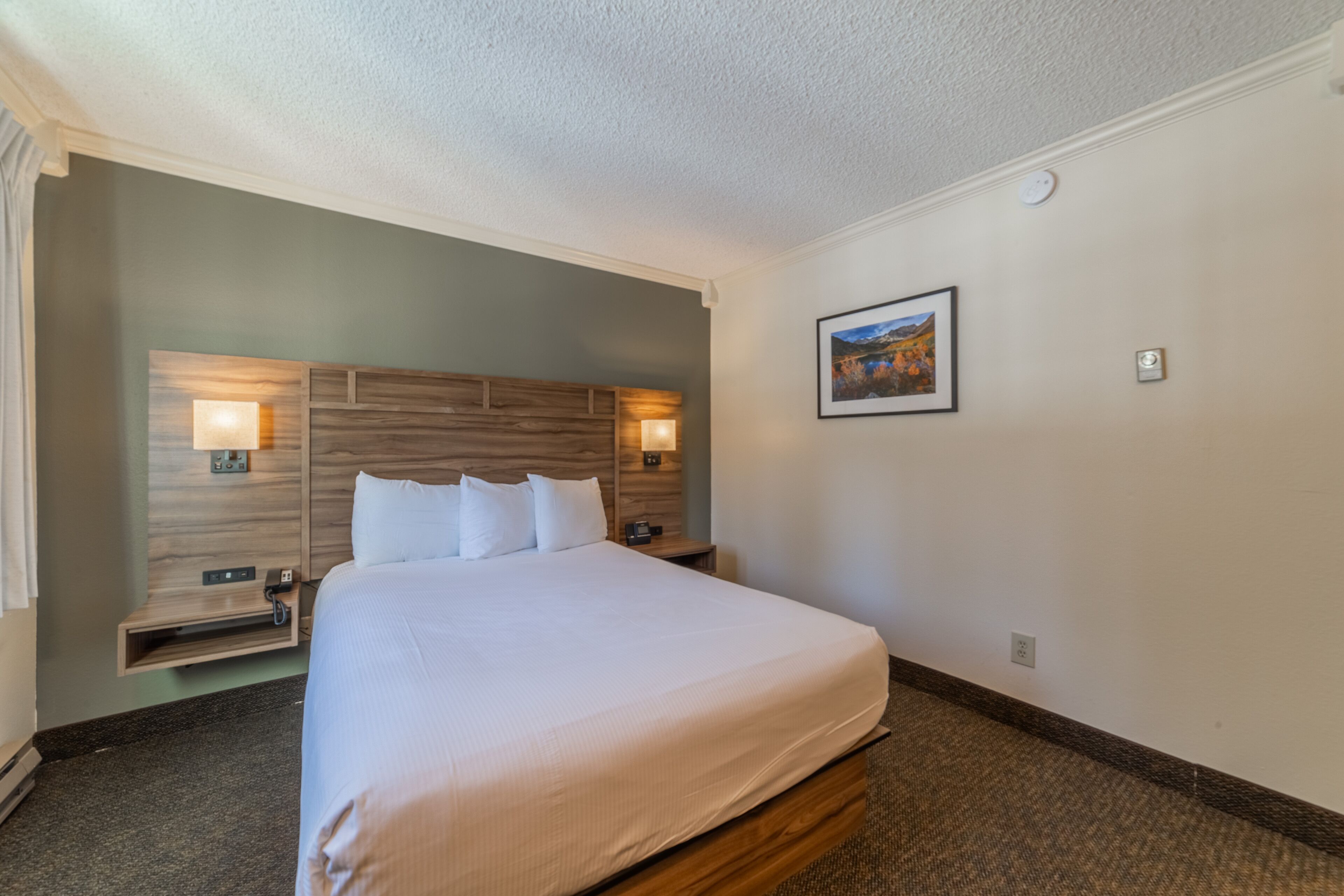 standard room, 1 queen bed, stair access only | 1 bedroom, in-room safe, desk, blackout curtains