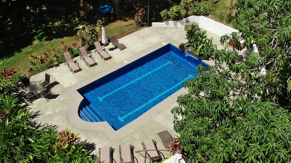 Outdoor pool, pool umbrellas, sun loungers