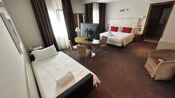 Deluxe Double + Sofa Bed | Down comforters, minibar, in-room safe, desk