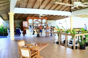 Breakfast, lunch, dinner served; pool views