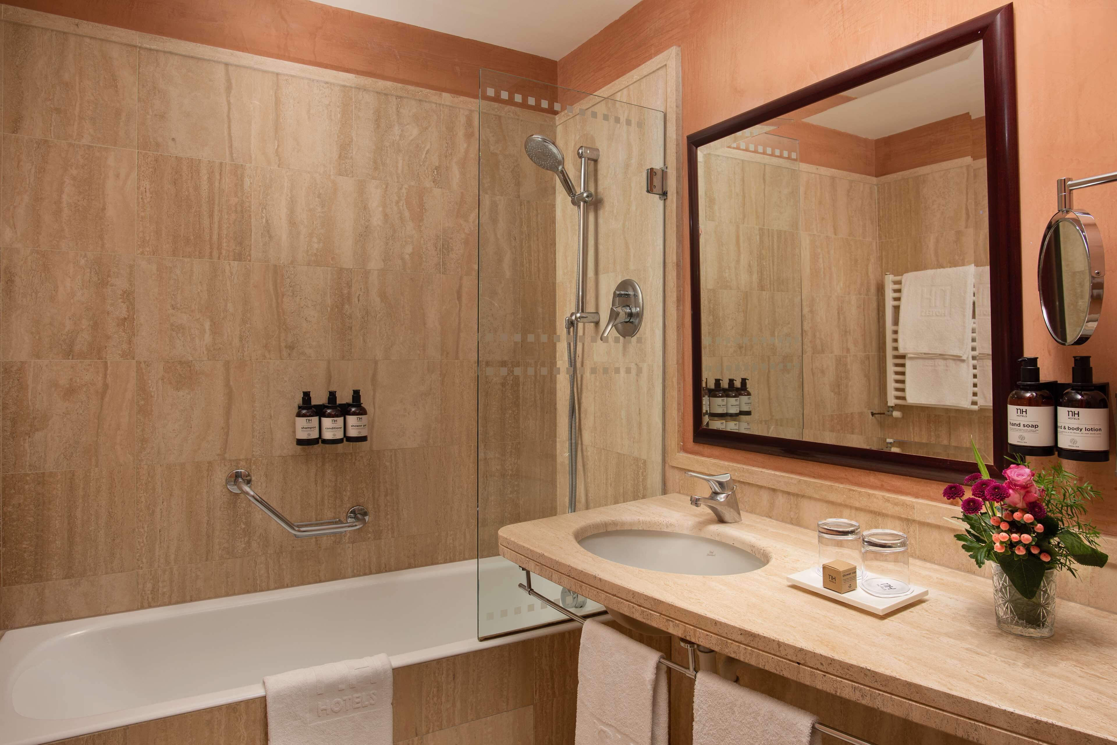 eco-friendly toiletries, hair dryer, bidet, towels