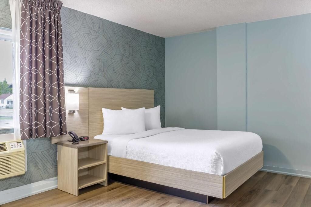 Chambre Deluxe, 1 grand lit, non-fumeurs | Literie de qualité supérieure, décoration personnalisée