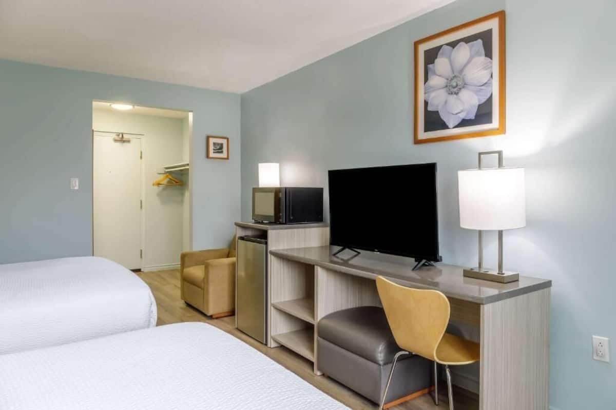Deluxe Room, 2 Queen Beds, Non Smoking | Premium bedding, individually decorated, individually furnished, desk