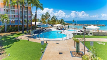 Outdoor pool, pool umbrellas, sun loungers