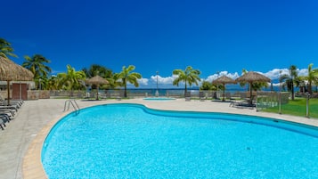 Outdoor pool, pool umbrellas, sun loungers